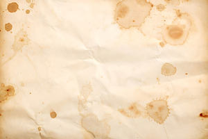 Ancient parchment texture stained with ink and time marks, a Background Photo by GoodGoods