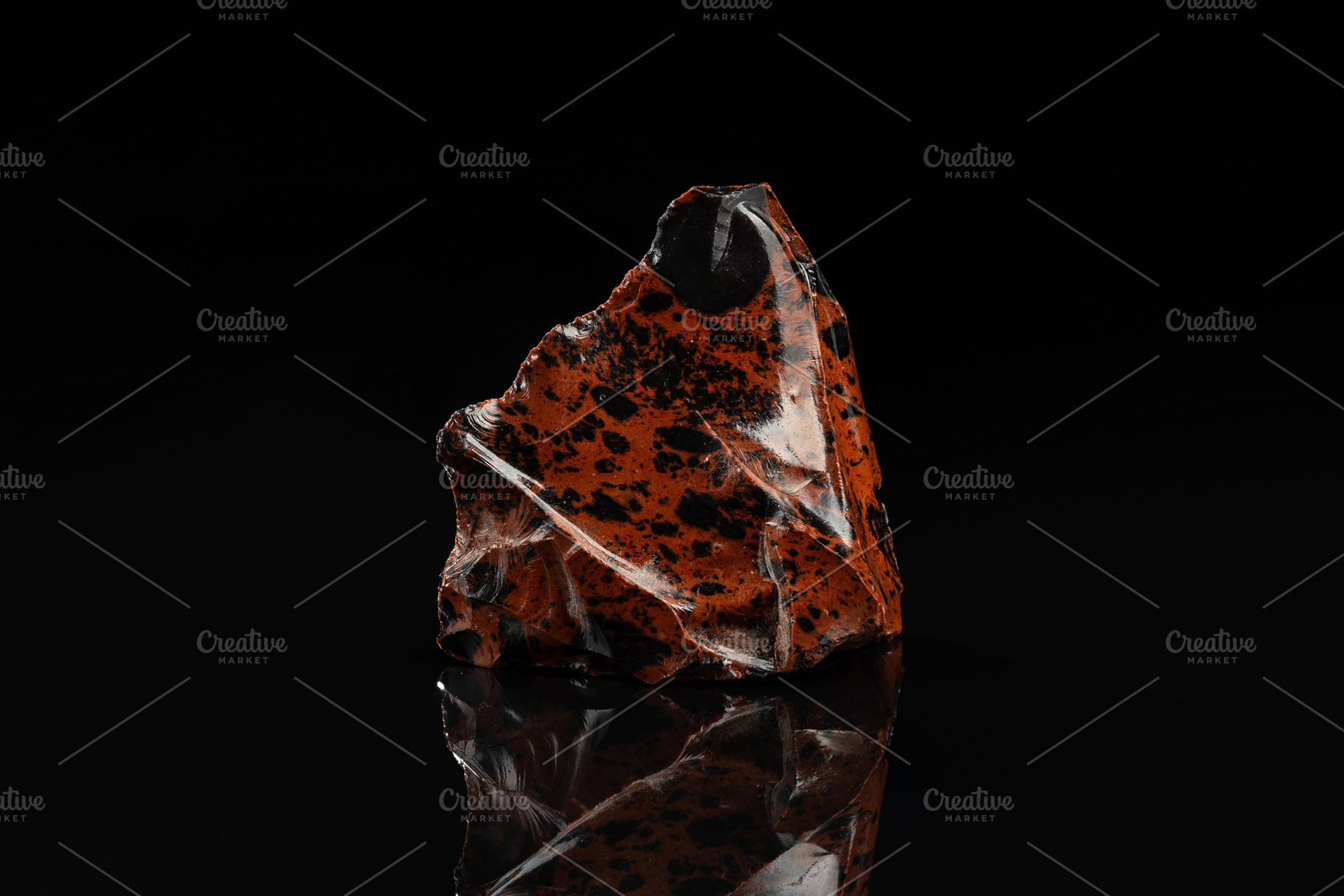 Mahogany Obsidian Uncut Gem Stone, an Industrial Photo by Andriana Syvanych