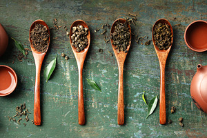 Variety of Loose Leaf Teas with Teapot and Cups on Rustic Backgr, a Food & Drink Photo by Natalia Klenova's Shop