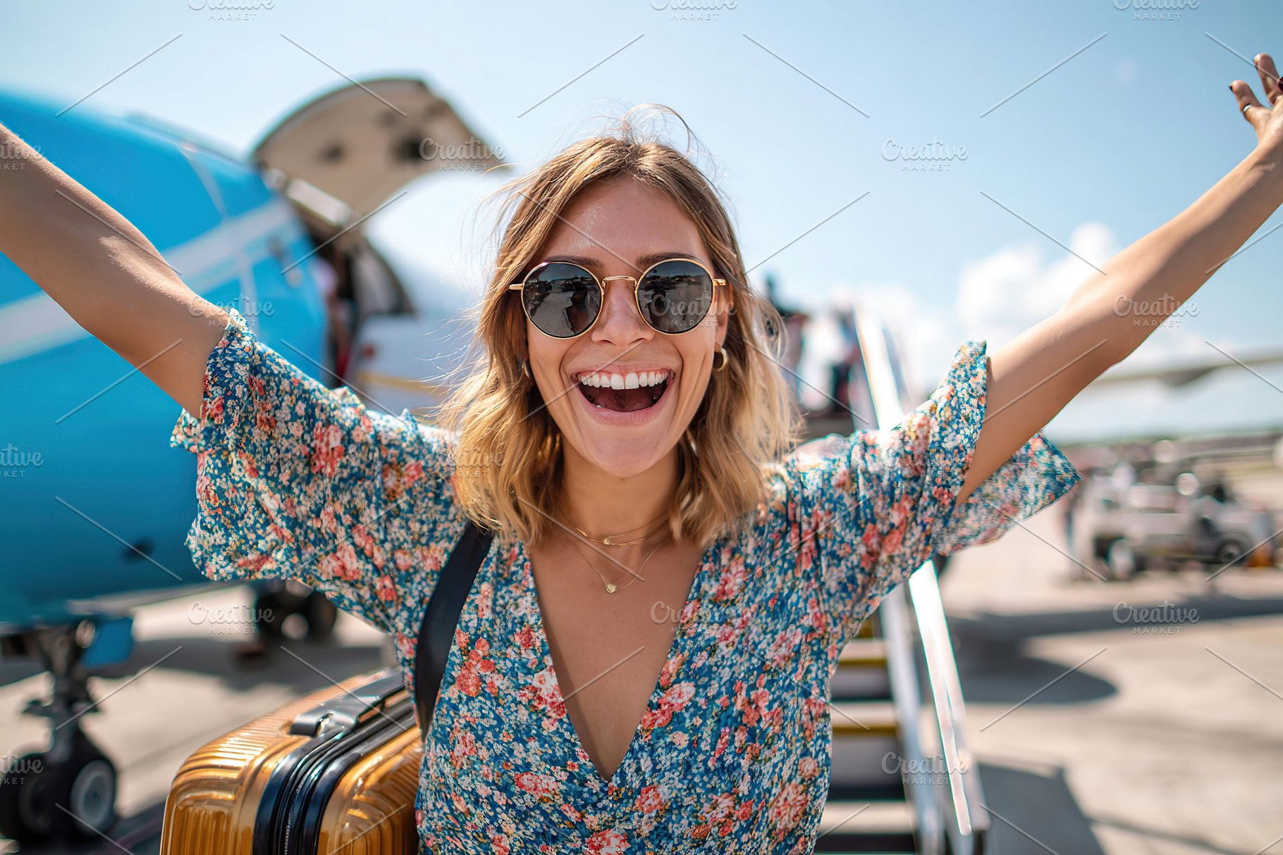 Cheerful woman with sunglasses enjoying her travel adventure at the airport und, a Person Photo by AlyaAnd