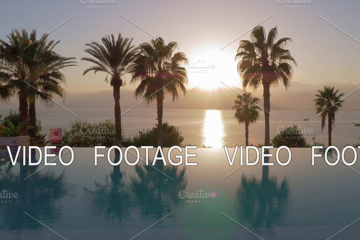Resort scene with sunset in, a Graphic by Grey Coast Media (Photo 1 of 2)