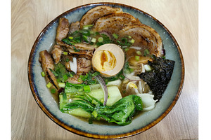 Ramen in ceramic bowl on wooden, a Food & Drink Photo by sceptical cactus
