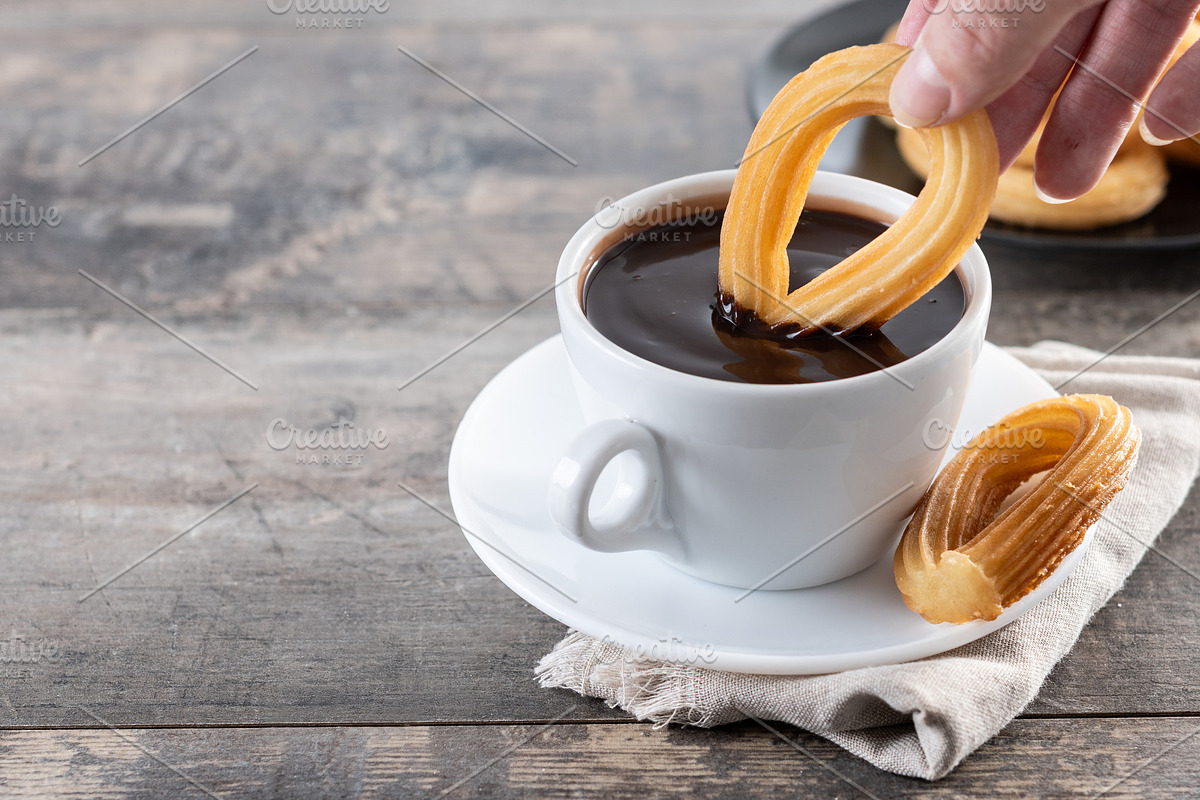 Eating traditional Spanish churros with hot chocolate, a Food & Drink Photo by etorres69 (Photo 1 of 2)
