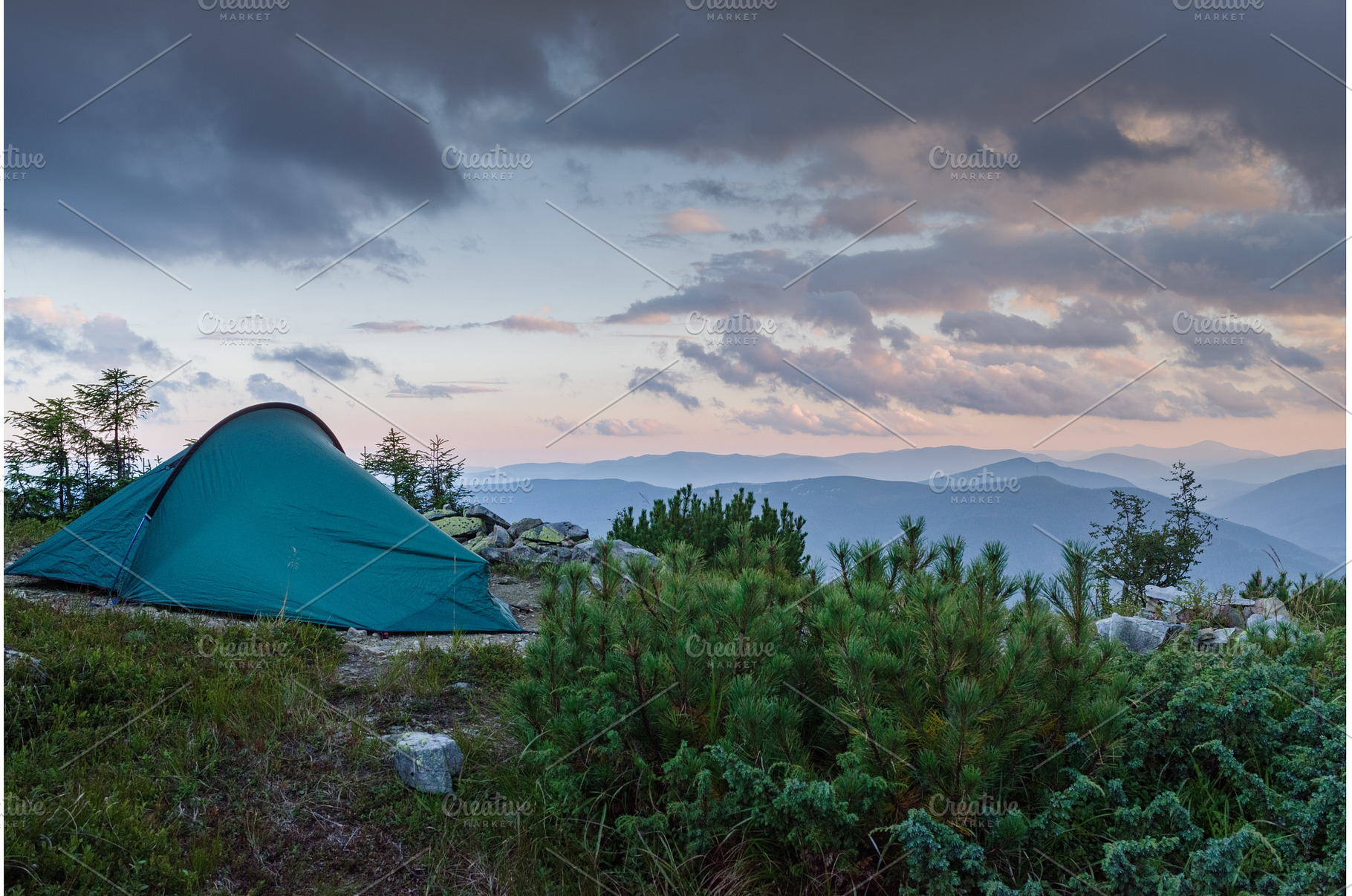 Camping tent on a mountain summit, a Nature Photo by Stockphoto by vzwer