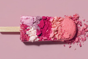 Colorful popsicle on pink surface, a Photo by Beautiful things