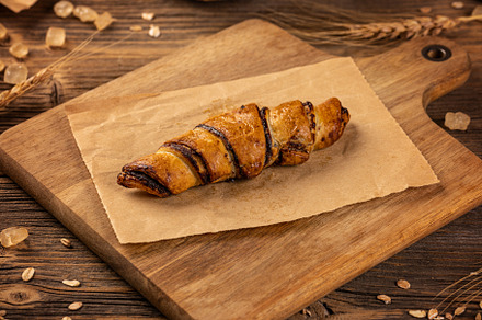 Sweet cocoa croissant roll, a Background Photo by Grafvision photography