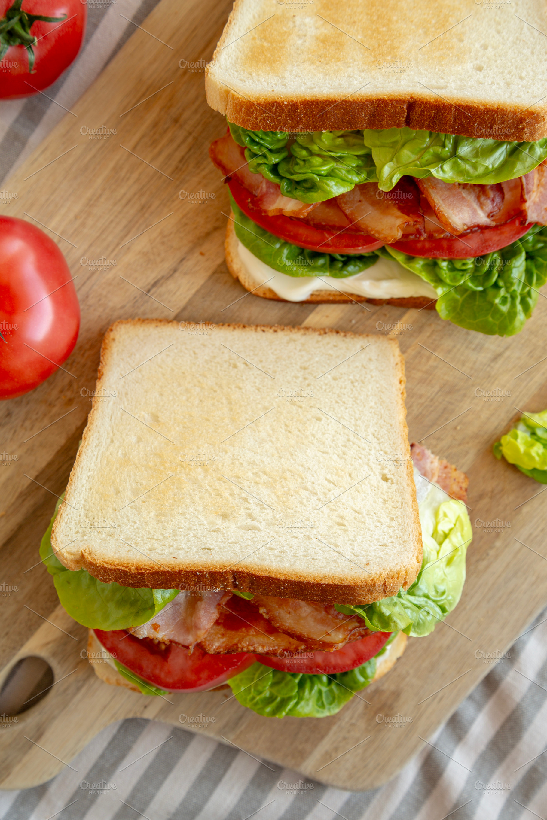 Homemade BLT (Bacon Lettuce Tomato) Sandwich with Mayo, top view, a Food & Drink Photo by LiudmylaChuhunova