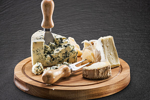 Cheese board with soft cheeses, a Food & Drink Photo by Volff