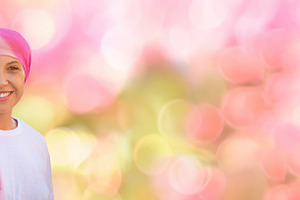 Smiling Cancer Survivor in Pink Headscarf with Soft Bokeh Copy S, a Person Photo by José Manuel Gelpi