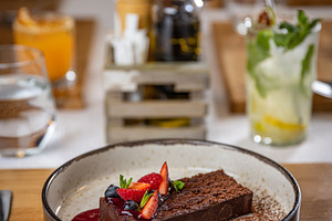 Chocolate cake with fresh berries, a Photo by Grafvision photography