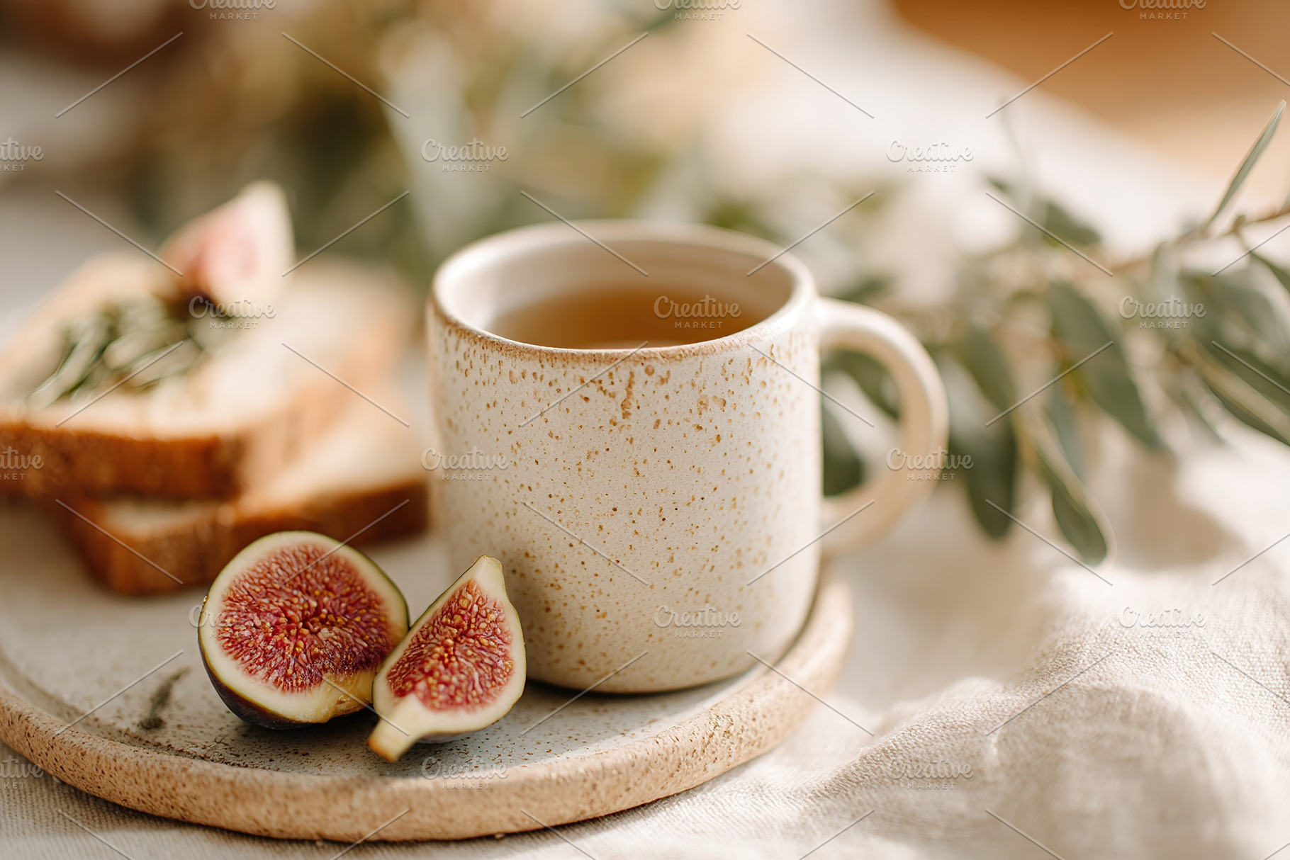 Breakfast featuring sourdough toast and fresh figs on a rustic table with tea, a Food & Drink Photo by AlyaAnd