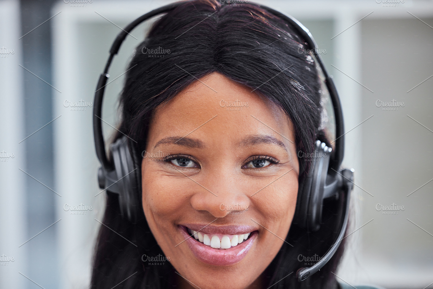 Call center, customer support and portrait of black woman consultant in corporate office for telemarketing. Customer service, crm and face of female consulting agent with smile for friendly service, a Photo by Peopleimages.com