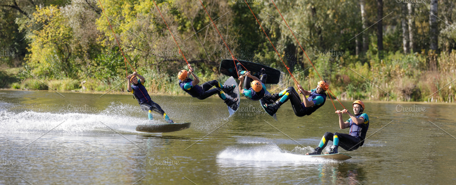 Sportsman on wakeboard performing back roll inversion on the river, a Sports & Recreation Photo by serkum