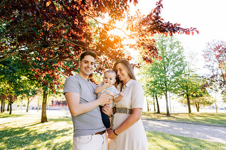 Portrait of a young family with their nine month old baby