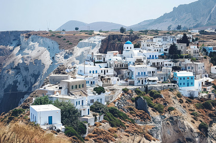 A charming village in Santorini feat, a Photo by Tanuart