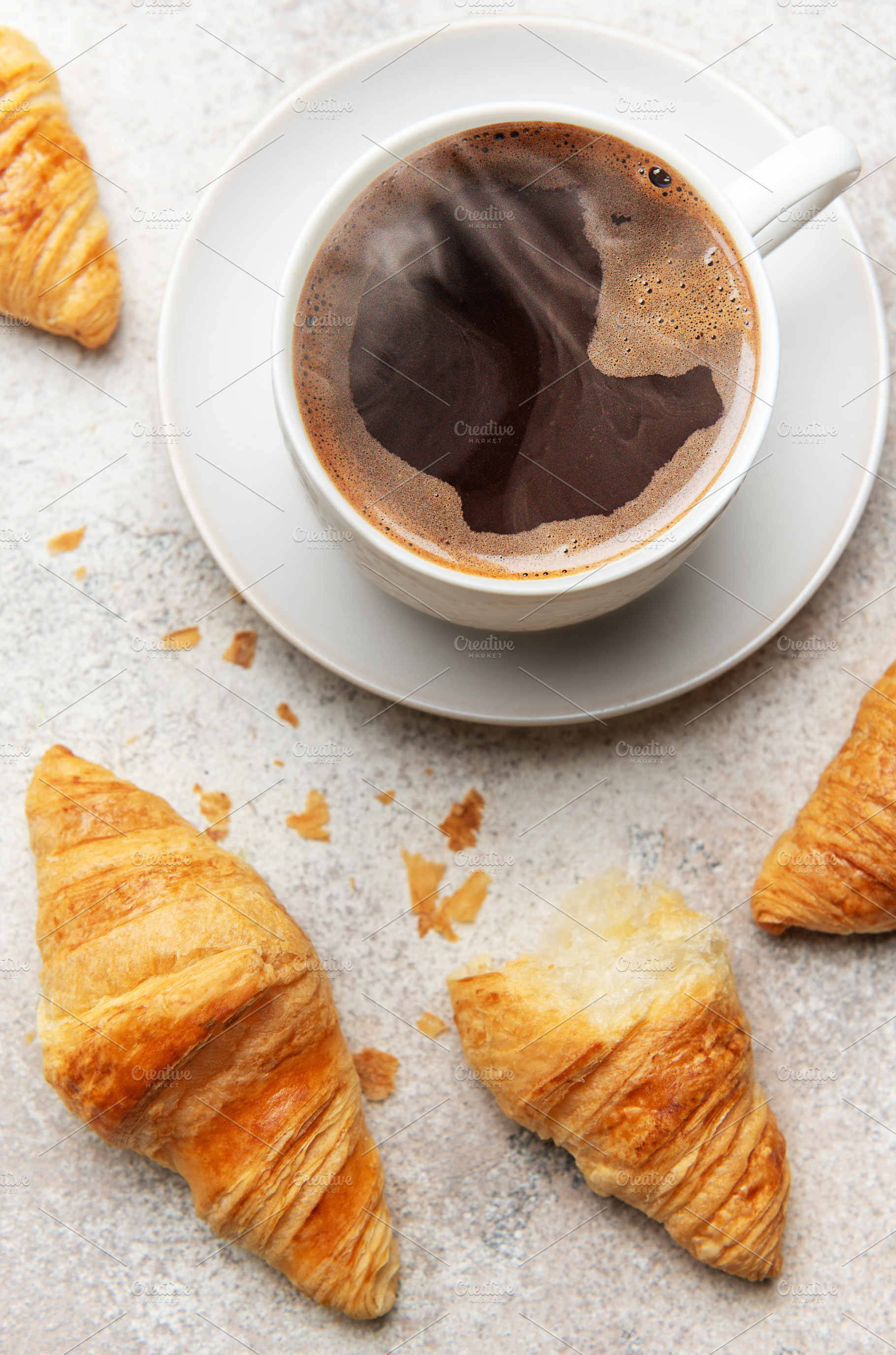 Freshly baked croissants and steaming cup of coffee creating per, a Food & Drink Photo by Olena Rudo