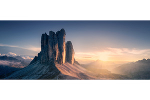 Epic rocky mountains at sunset in, a Nature Photo by den-belitsky