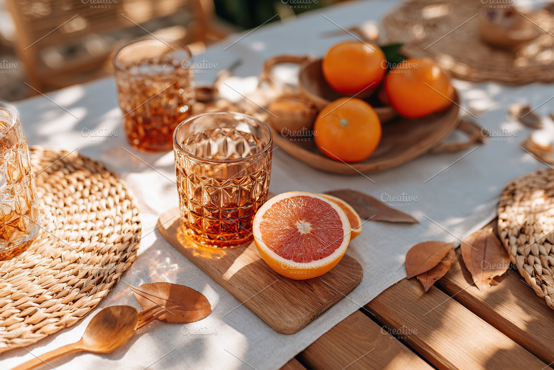 Summer brunch table set with citrus fruits and refreshing drinks in a bright ou, a Food & Drink Photo by AlyaAnd