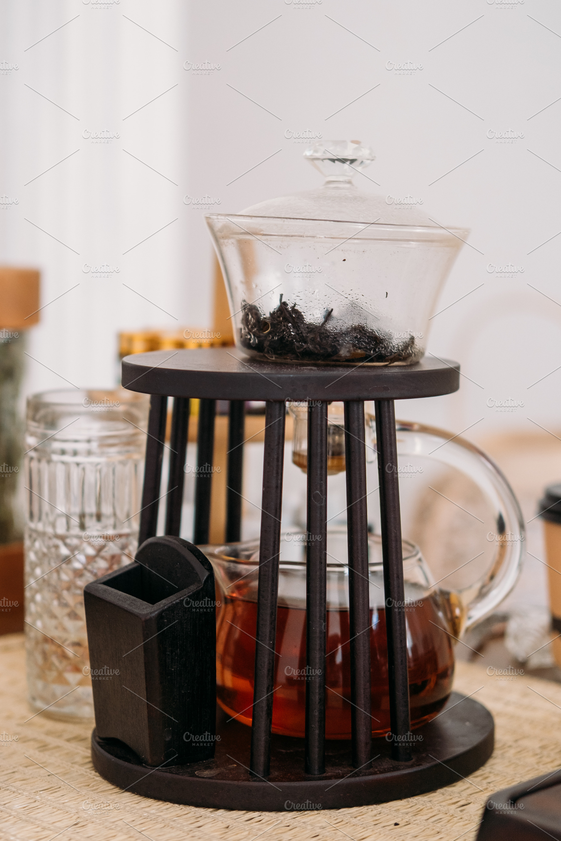 Glass teapot healthy herbal drink brew ceremony, a Food & Drink Photo by Photo Drive Studio