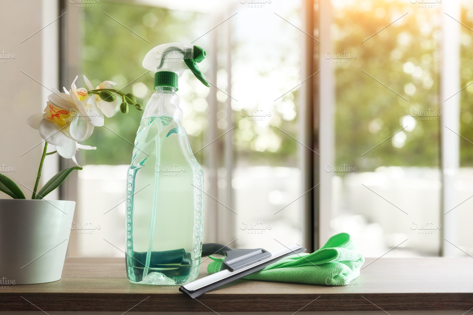 Window cleaner tools on wooden table and background glass window, a Health & Medical Photo by Davizro's Market