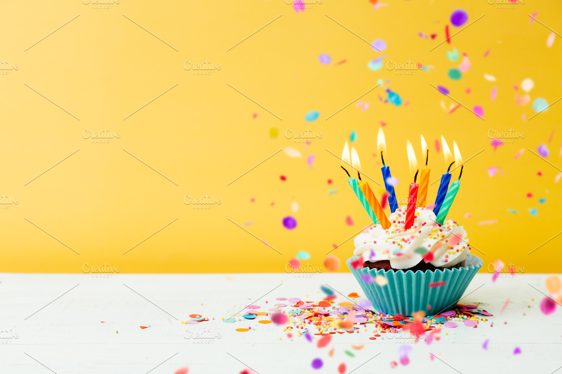 Birthday cupcake with many candles a, a Food & Drink Photo by asife