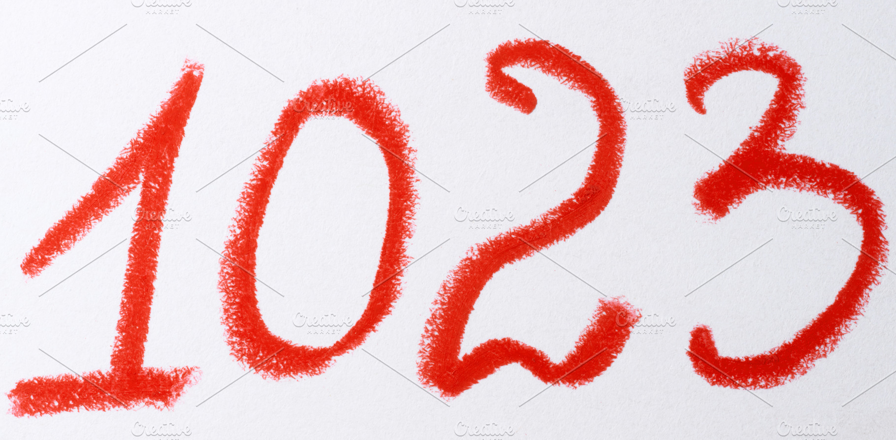A number written in red chalk or pastel on a white background, w, an Abstract Photo by ndanko