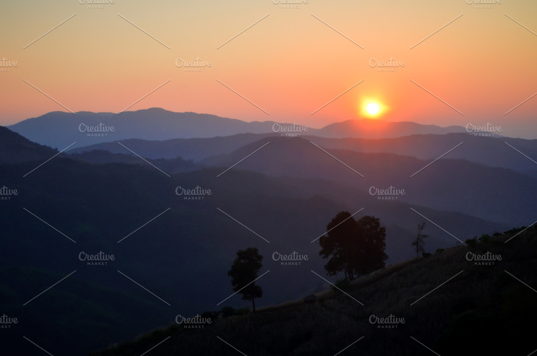 Sunrise on mountain containing autumn, background, and beautiful, a Nature Photo by Artmeesri
