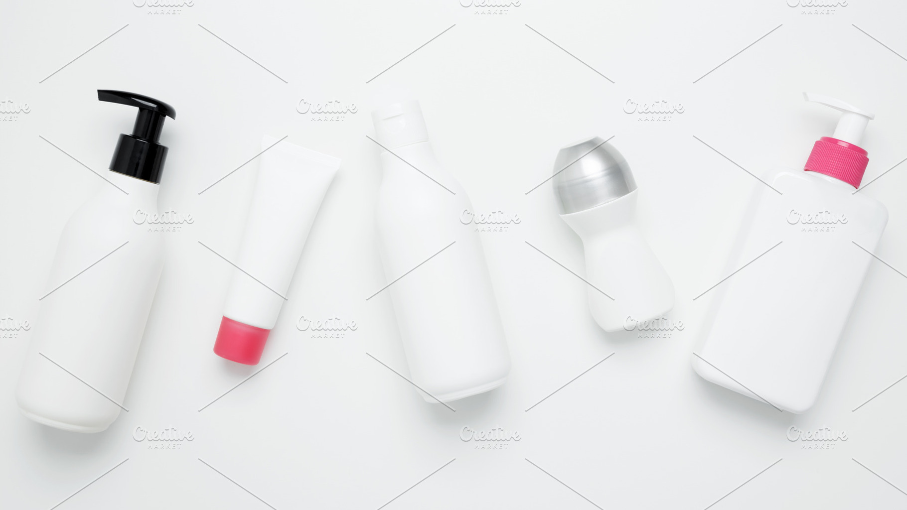 Cosmetic and skincare products including bottles and tubes arranged for brandin, a Photo by matucha