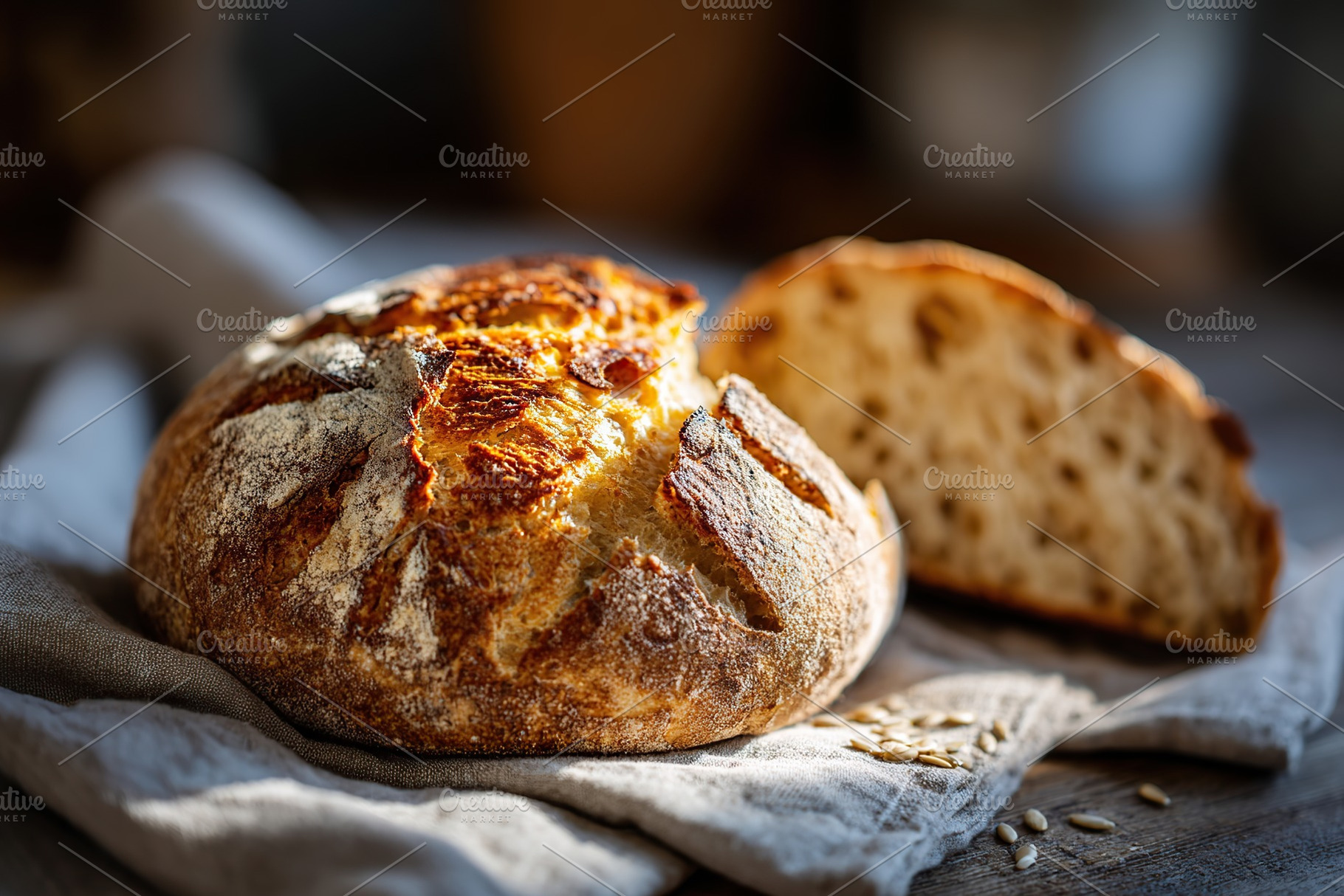 Freshly baked grain sourdough bread with seeds resting on linen cloth, a Photo by AlyaAnd