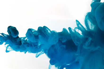 Blue clouds of ink in liquid isolated on white, an Abstract Photo by eleana