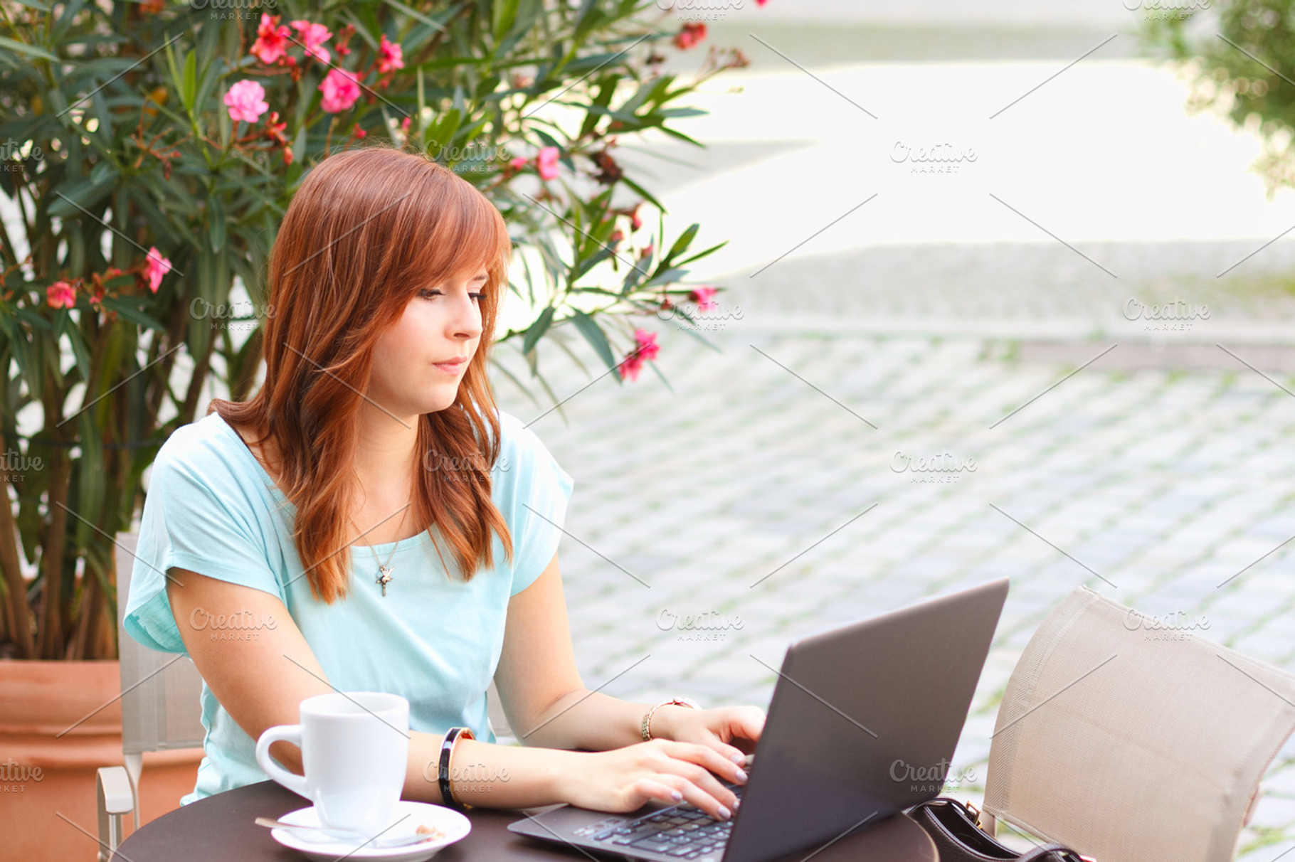 Woman Working At The Cafe Stock Photo