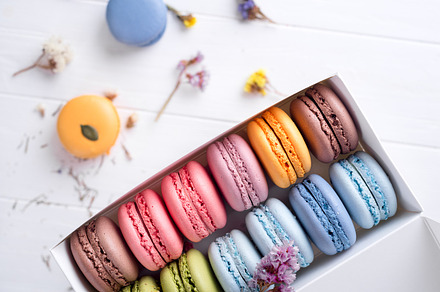 Colorful macaroons sweet macarons featuring macaroon, sweet, and meringue, a Food & Drink Photo by YuMyart