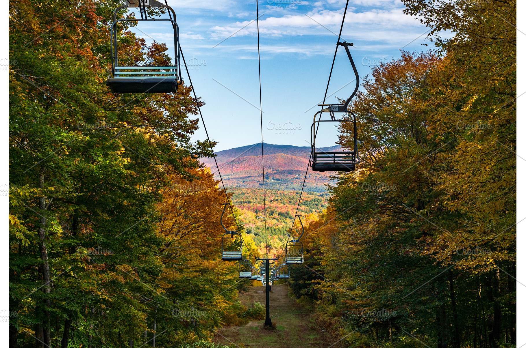 Ski lift chairs up Mount Mansfield, a Nature Photo by Backyard Stock