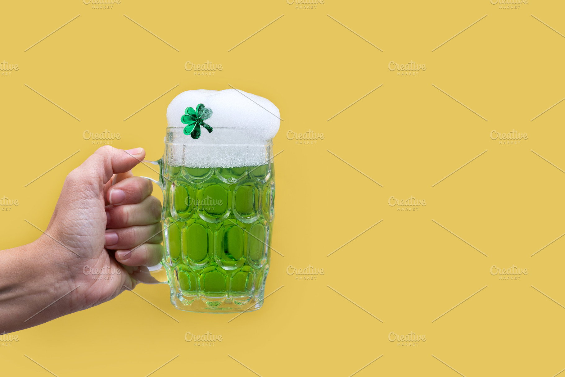 Green beer mug with foam for St. Patrick’s Day, a Food & Drink Photo by etorres69