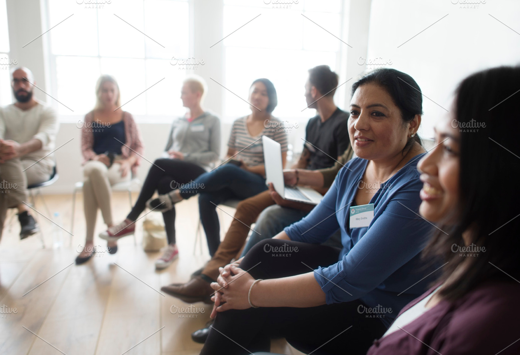 Diverse group of people in a seminar featuring person, discussion, and indoors, a Person Photo by rawpixel