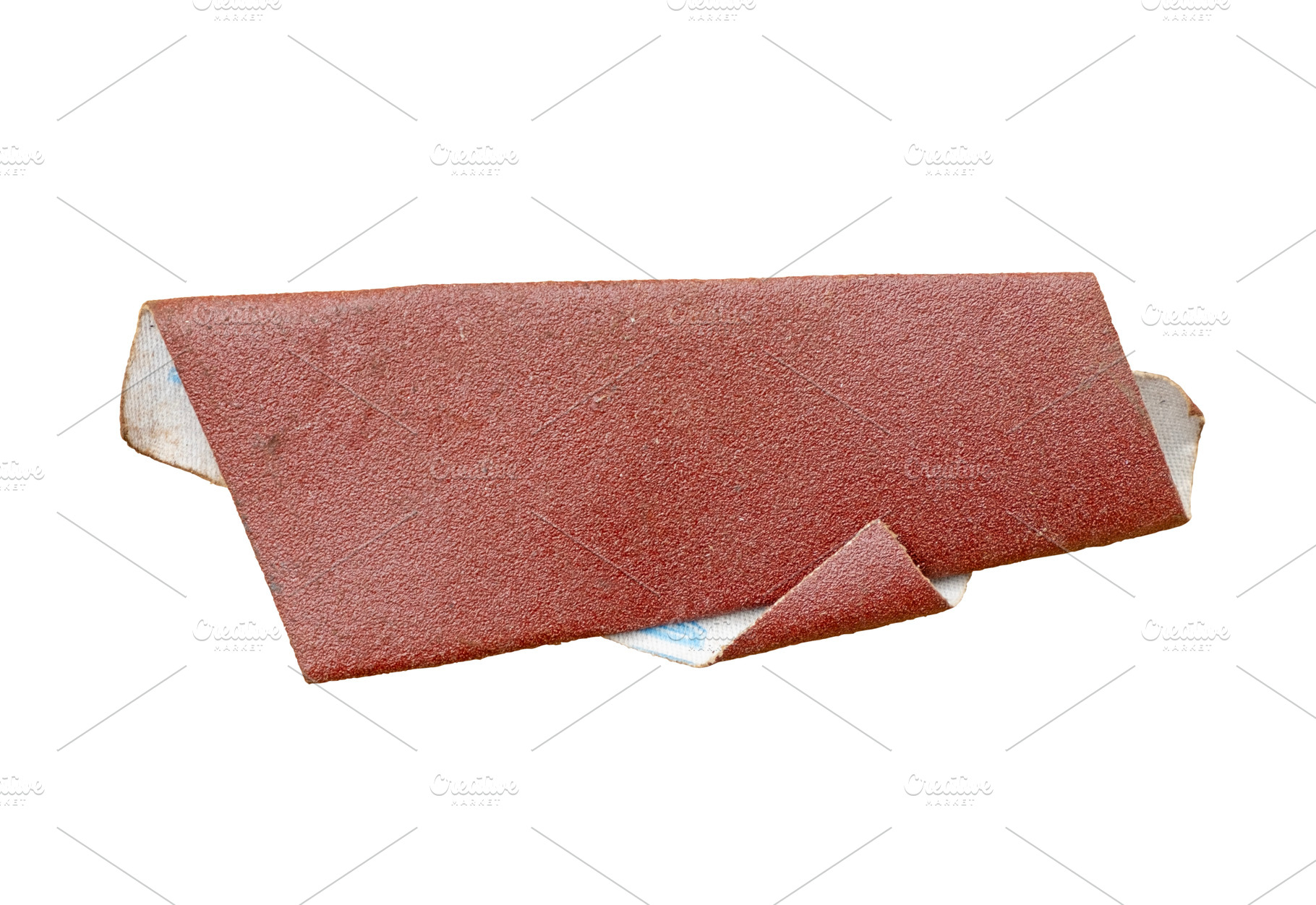 Old sandpaper isolated, an Industrial Photo by BOOCYS