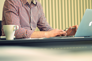 Man working in office stock photo containing man and working