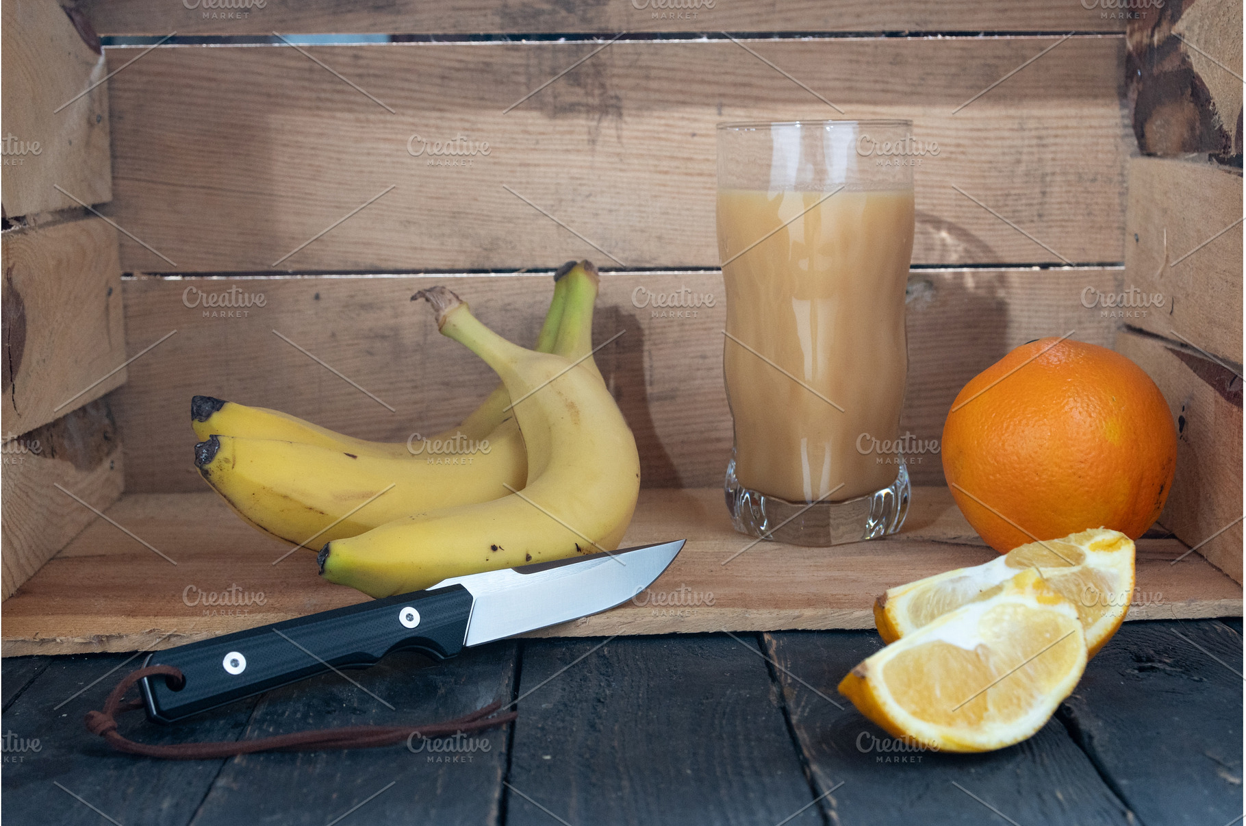 Knife and sliced orange. Fruits in a, a Food & Drink Photo by Stockphoto by vzwer