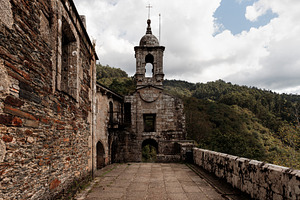 Ancient ruined monastery with a bell, an Architecture Photo by Perpis