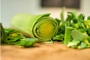 Cooking leeks in a home kitchen on a, a Graphic by darksoul72