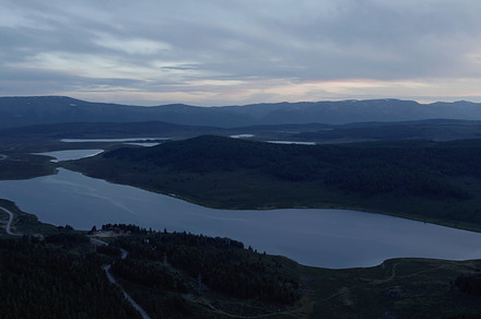 Aerial view on lakes and mountains with dramatic sky in Altai, a Nature Photo by TravelFlow