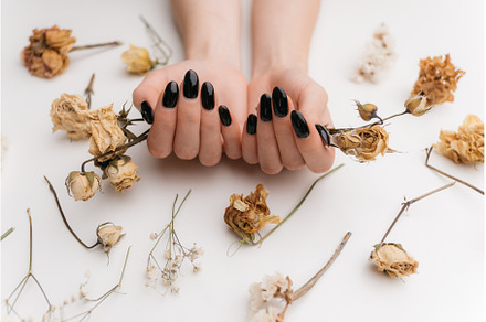 Female hands with black manicure, a Beauty & Fashion Photo by P&G