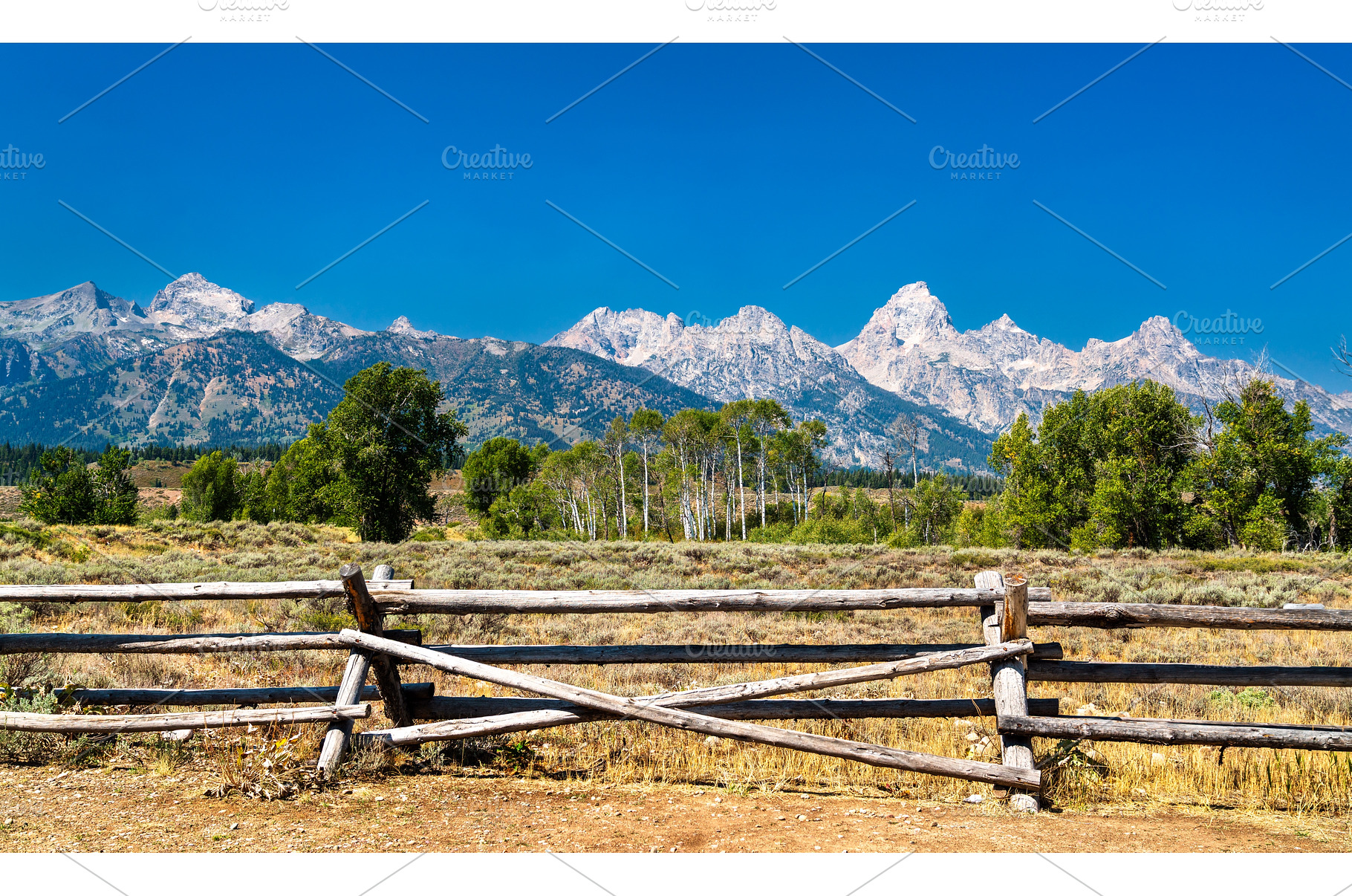 Rustic wooden fence with Teton Range, a Nature Photo by Leonid Andronov