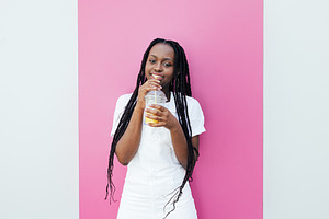 Young woman with braids, a Person Photo by Artem Varnitsin