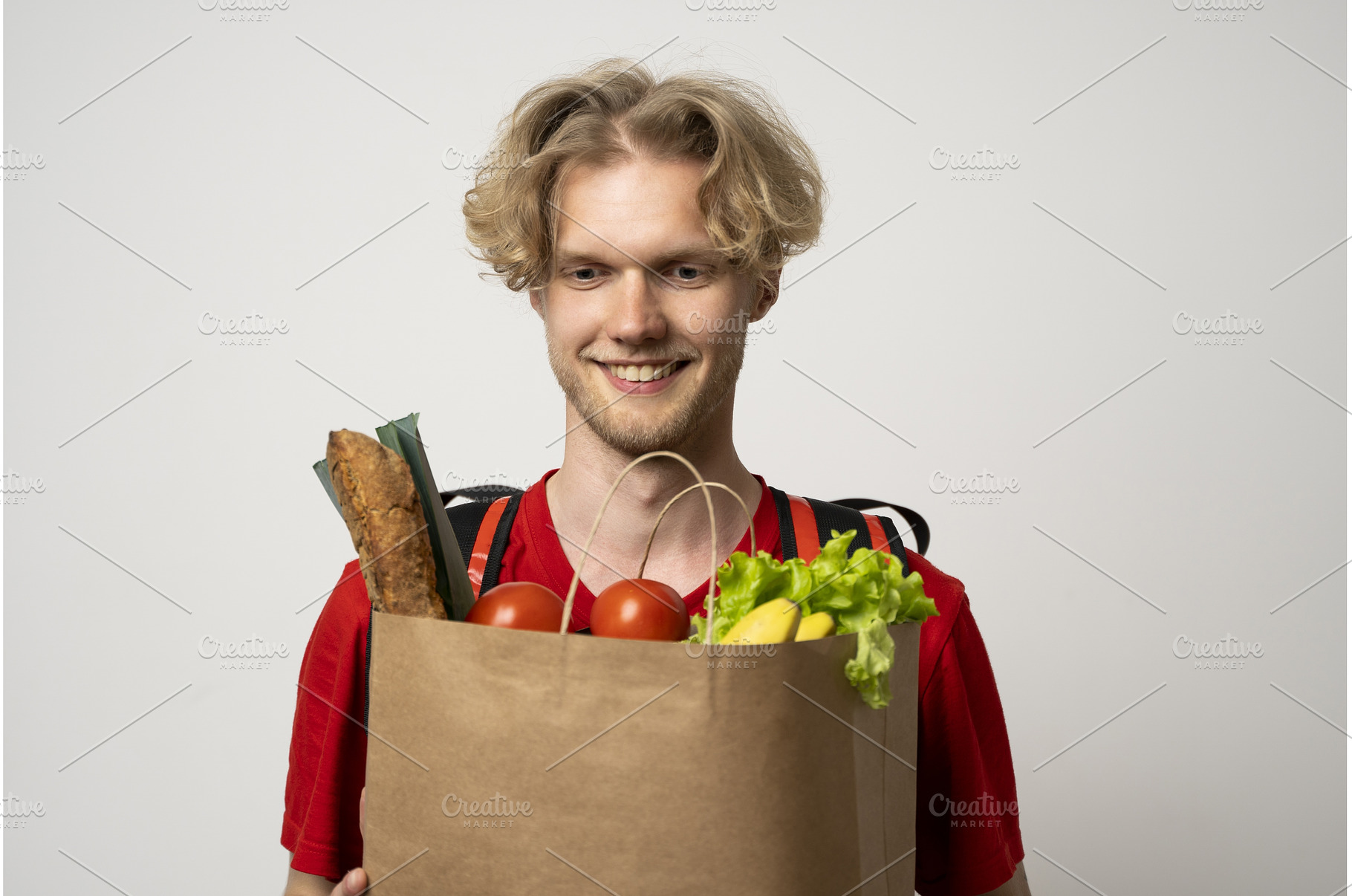 Delivery. Handsome Caucasian grocery, a Person Photo by volodymyrshtun13795