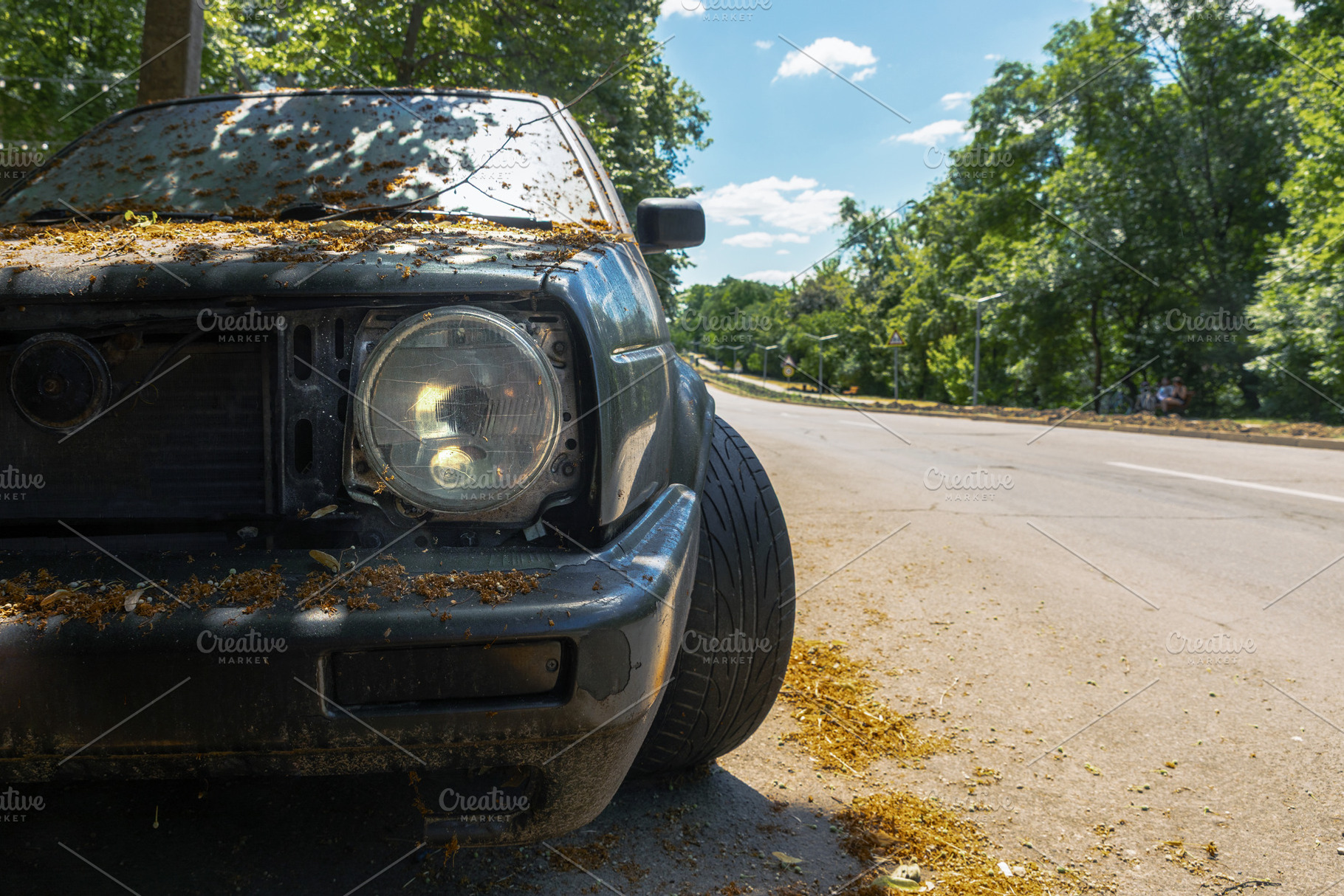 Front view of an old, broken car with one missing headlight and, a Transportation Photo by Ales Munt