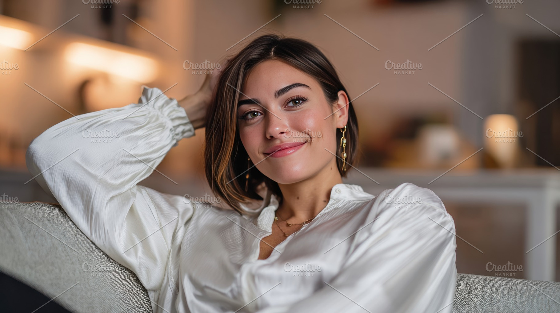 Smiling woman sitting on couch, a Photo by Beautiful things