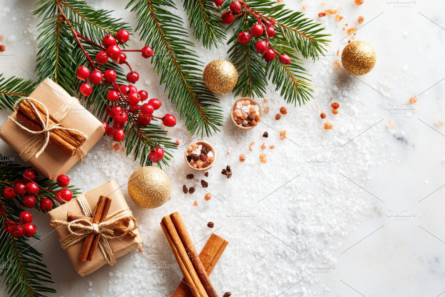 Festive holiday gifts with decorations on snow, a Holiday Photo by AlyaAnd
