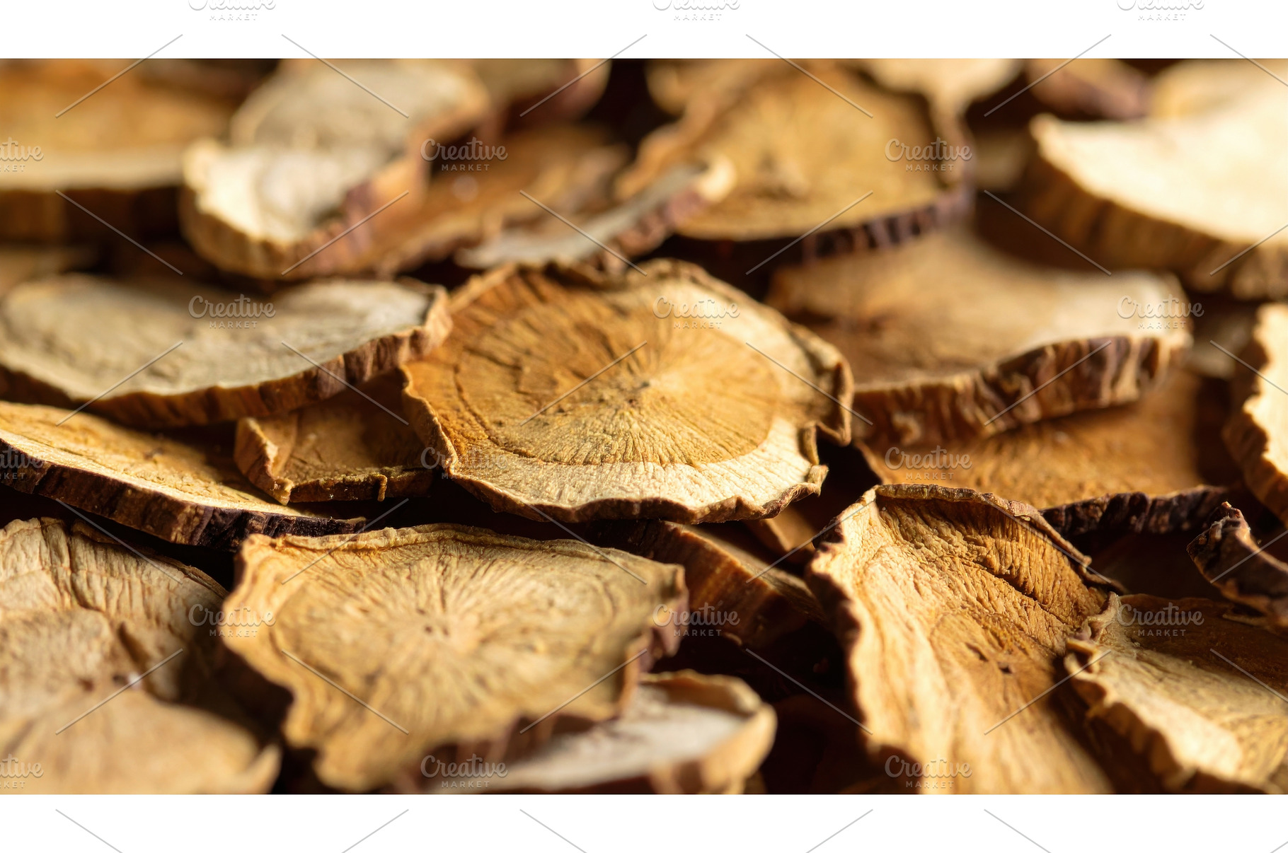 Close-up of dried herbal root slices, a Nature Photo by Igor Tichonow