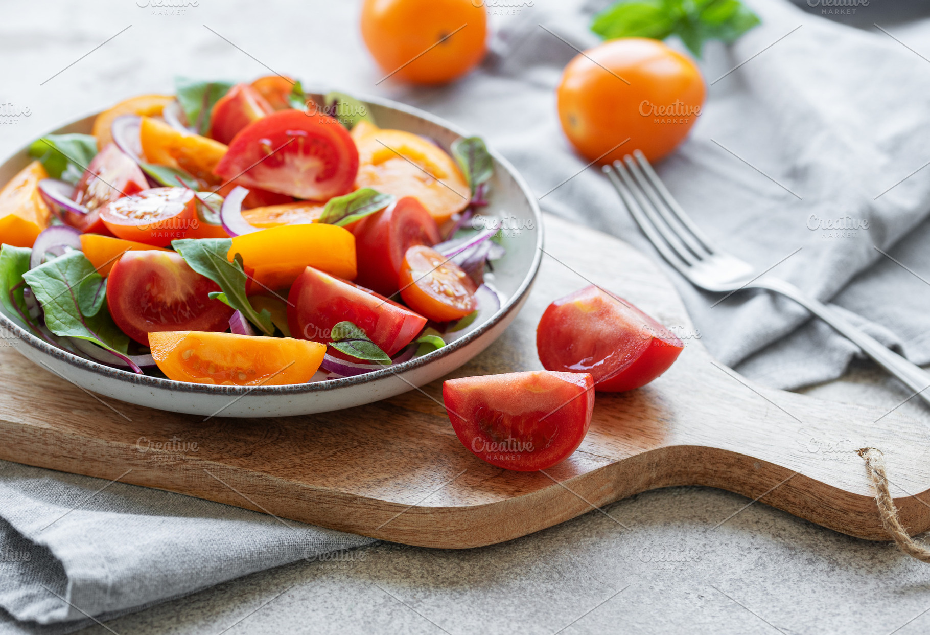 Green salad from leaves and tomatoes, a Food & Drink Photo by Olena Rudo
